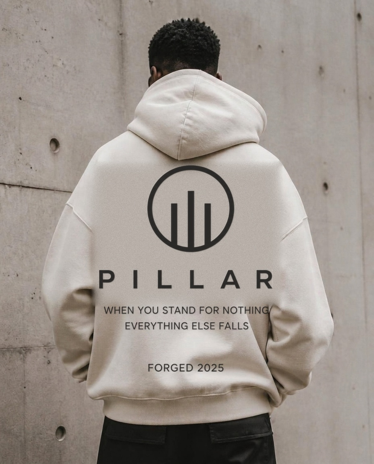 Standing Black male model showing the back of the off-white PILLAR Forged Hoodie